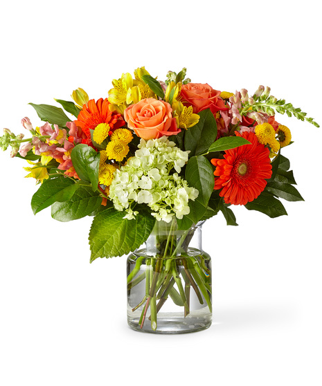 Autumn Flowers Arranged in a Glass Vase