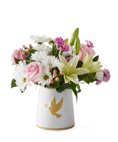 Sympathy flowers in a vase symbolizing love and peace