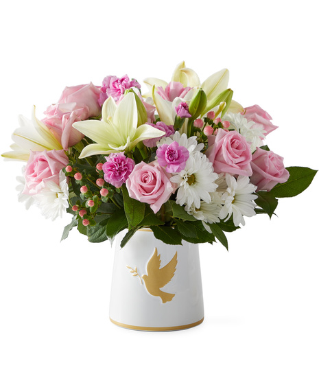 Sympathy flowers in a vase symbolizing love and peace