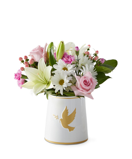 Sympathy flowers in a vase symbolizing love and peace