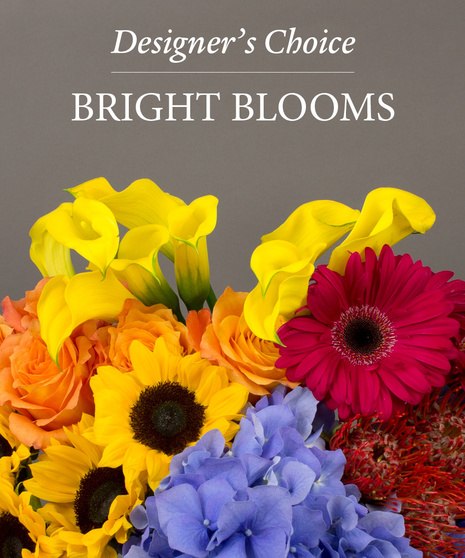 Mixed Bright Flowers in a Glass Vase