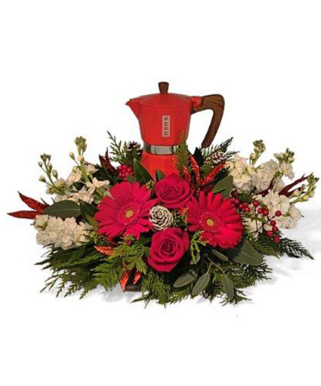 Christmas floral arrangement designed around red stovetop espresso maker