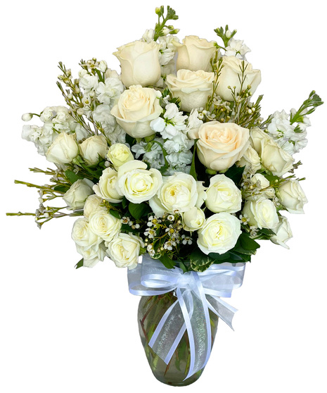 White Flowers designed in a clear glass vase