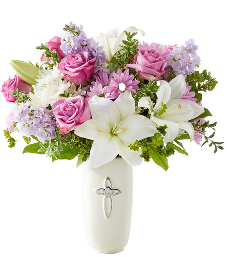 Sympathy arrangement with daisies, roses, tock and lilies in ceramic pot with silver cross.