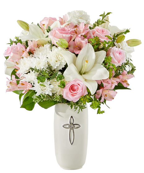 Elegant sympathy arrangement with roses, alstroemeria, carnations and lilies.