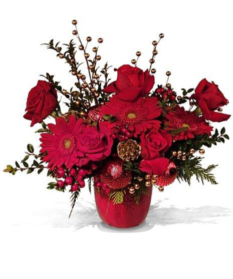 Christmas arrangement in red container with red gerbera daisies and red roses