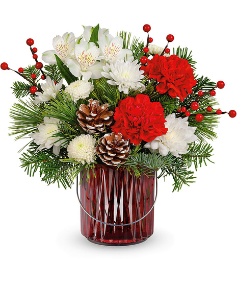 Christmas arrangement in red lantern vase