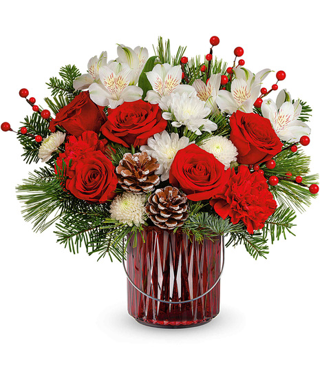 Christmas arrangement in red lantern vase