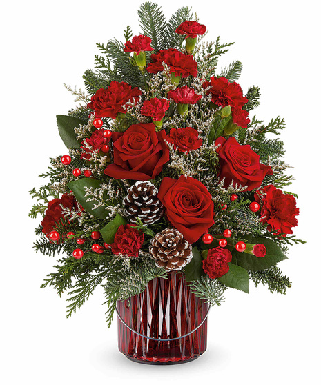 Christmas Tree inspired floral arrangement includes a Merry Glow Lantern