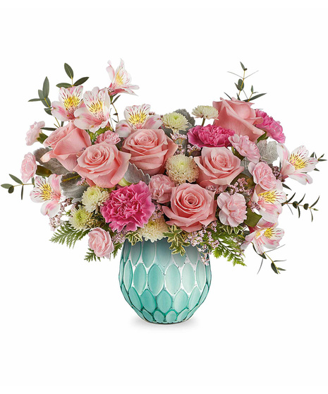 Dream in colour bouquet featuring pink roses, asltroemeria, carnations, and white chrysanthemums in a frosted turquoise vase with a mercury finish.